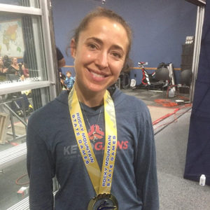 Gina Mohr dons her powerlifting medal from the Rocky Mountain State Games
