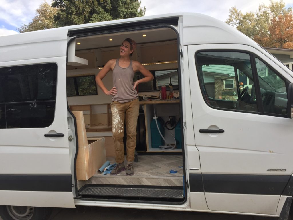 Katie Bessert inside a camper van